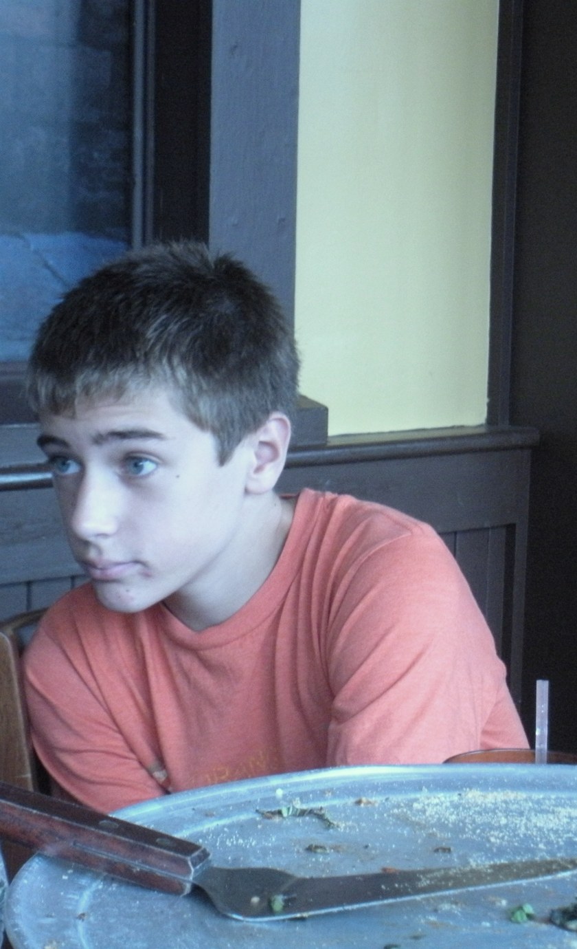 Will is about to duck under the table.