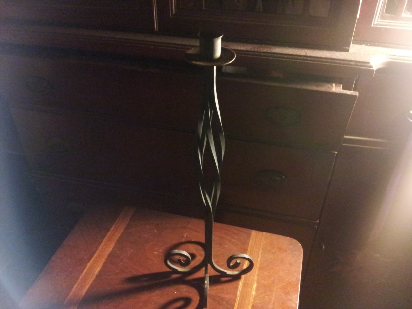 This is cast iron and VERY tall.