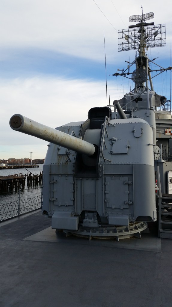The business end of the two front gun mounts, plus the fire control director and radars.