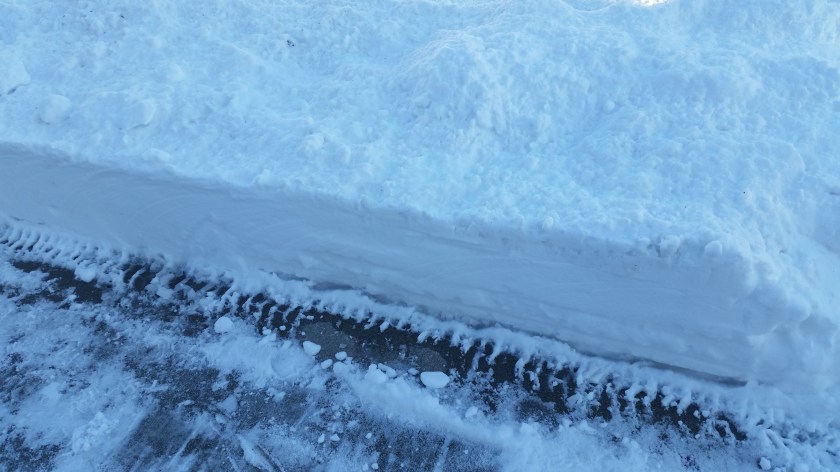 One of our neighbors kindly cleared most of the driveway and part of the walk for us with a snowblower. We love Winthrop.